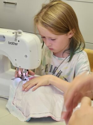 girl sewing